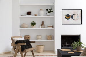 Minimalism focuses on the art of styling open shelves with a balanced home decor aesthetic.