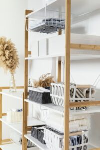 Smart storage solutions are key in minimalist interior design, keeping clutter hidden while maintaining a clean, organized look in the home.